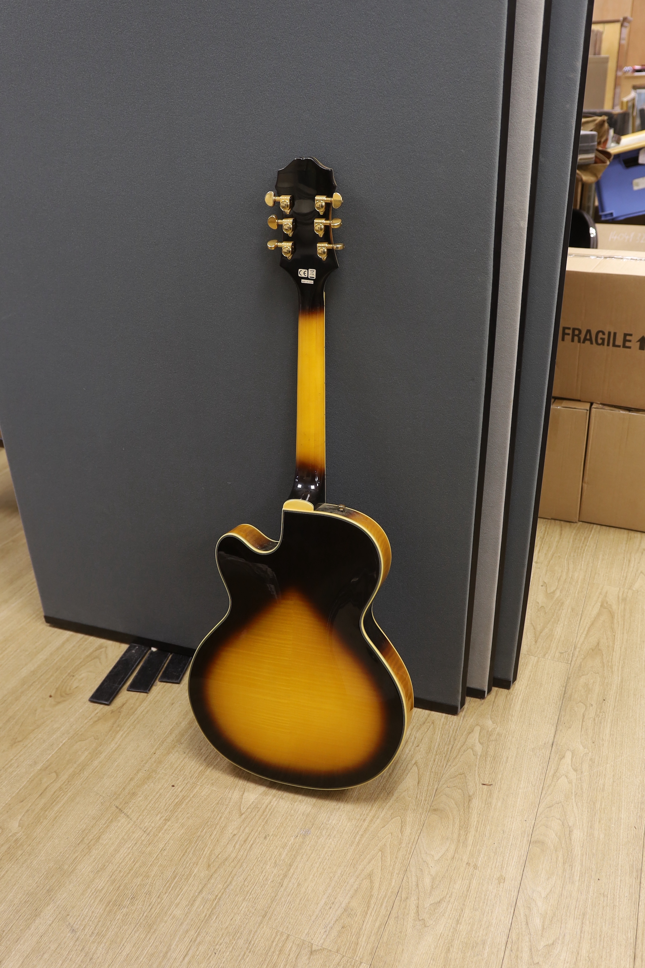 An Epiphone Joe Pass signature Emperor II guitar in hard case